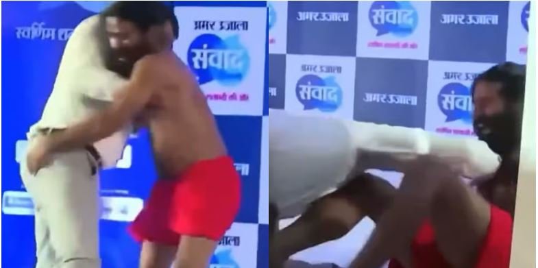 టీవీ ఛానల్ చర్చ మధ్యలో కుస్తీ, రాందేవ్ బాబాను ఎత్తిపడేసిన ప్యానలిస్ట్